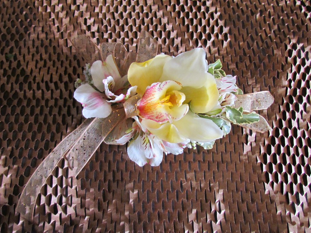 Orchid corsage with ribbon